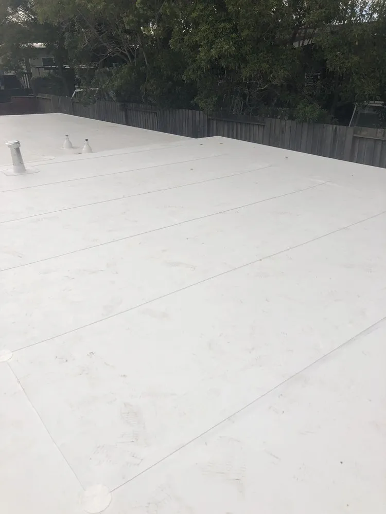 Slide of Escalante Roofing