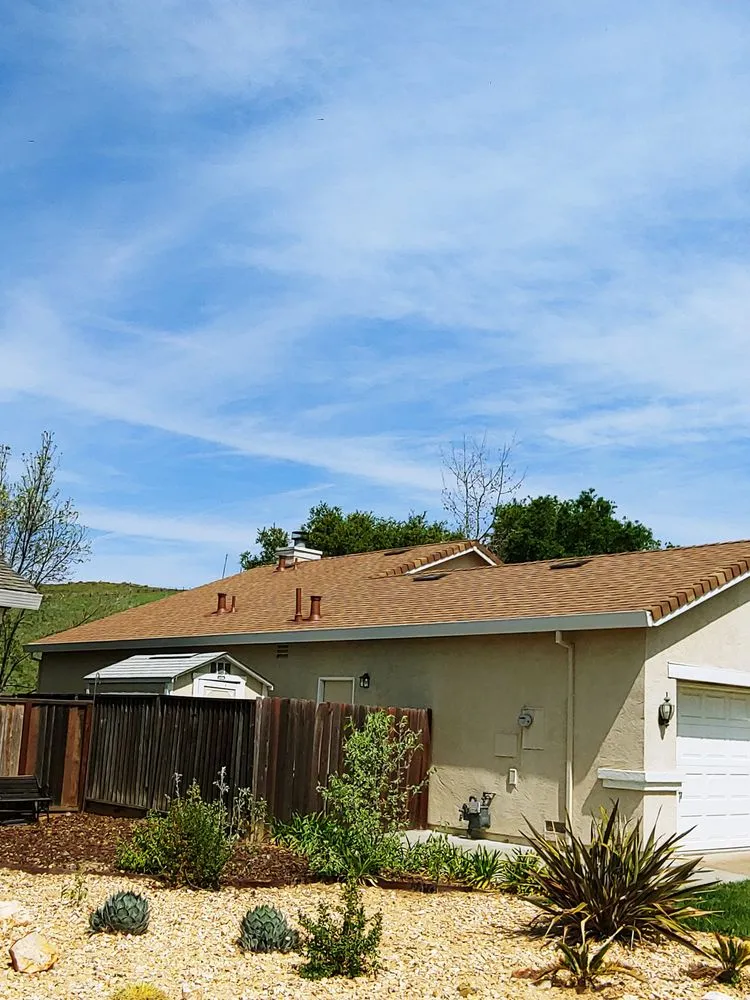Slide of Escalante Roofing