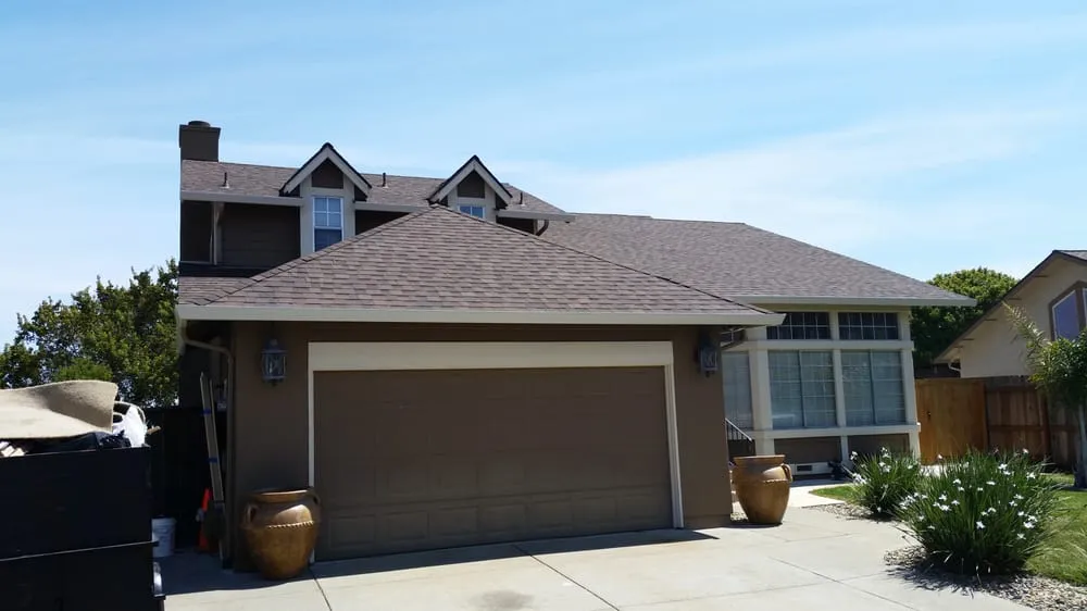 Slide of Escalante Roofing