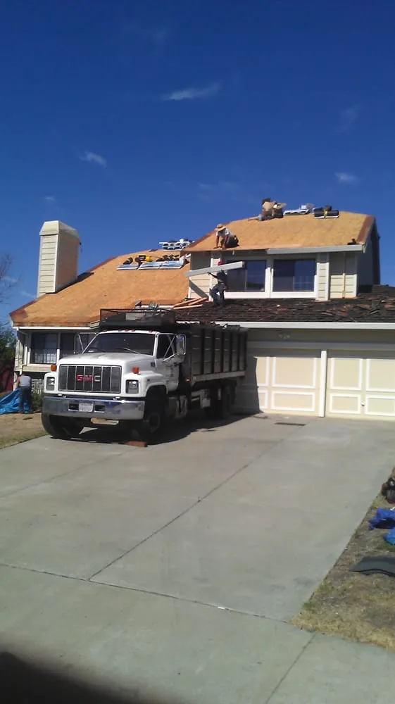 Slide of Escalante Roofing