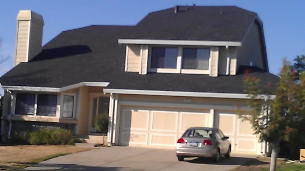 Slide of Escalante Roofing