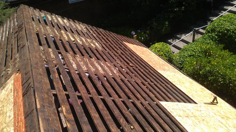 Slide of Escalante Roofing