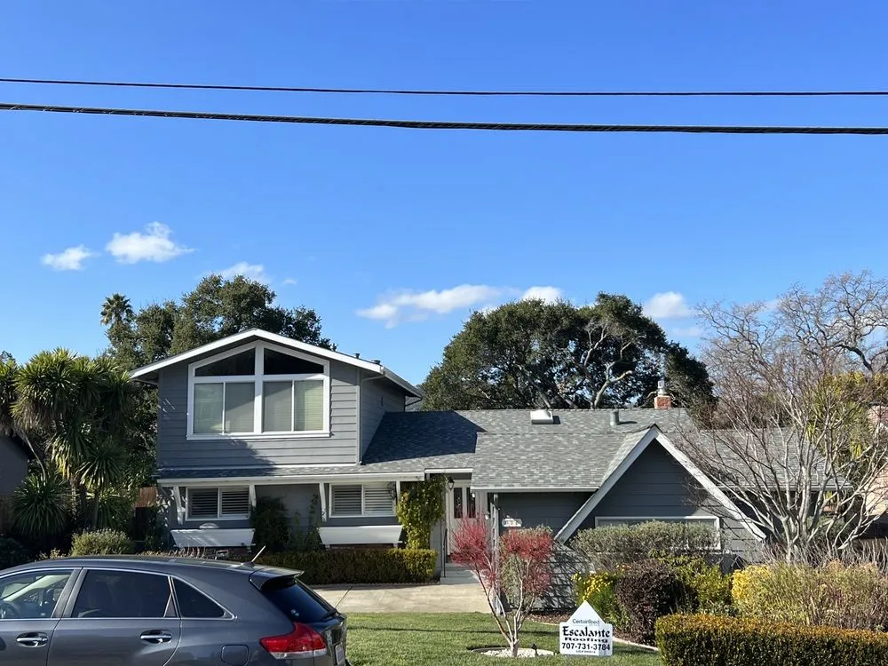 Slide of Escalante Roofing