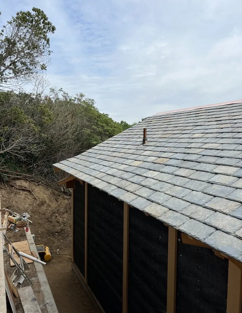 Slide of Escalante Roofing