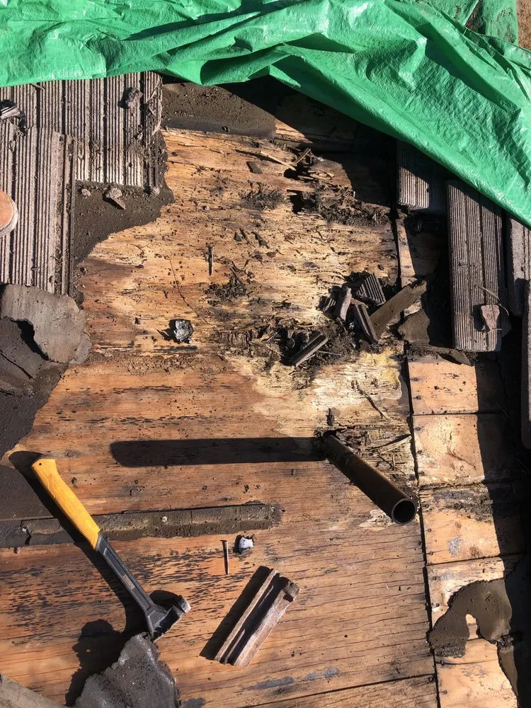 Slide of Escamilla’s Roofing and Rain Gutters