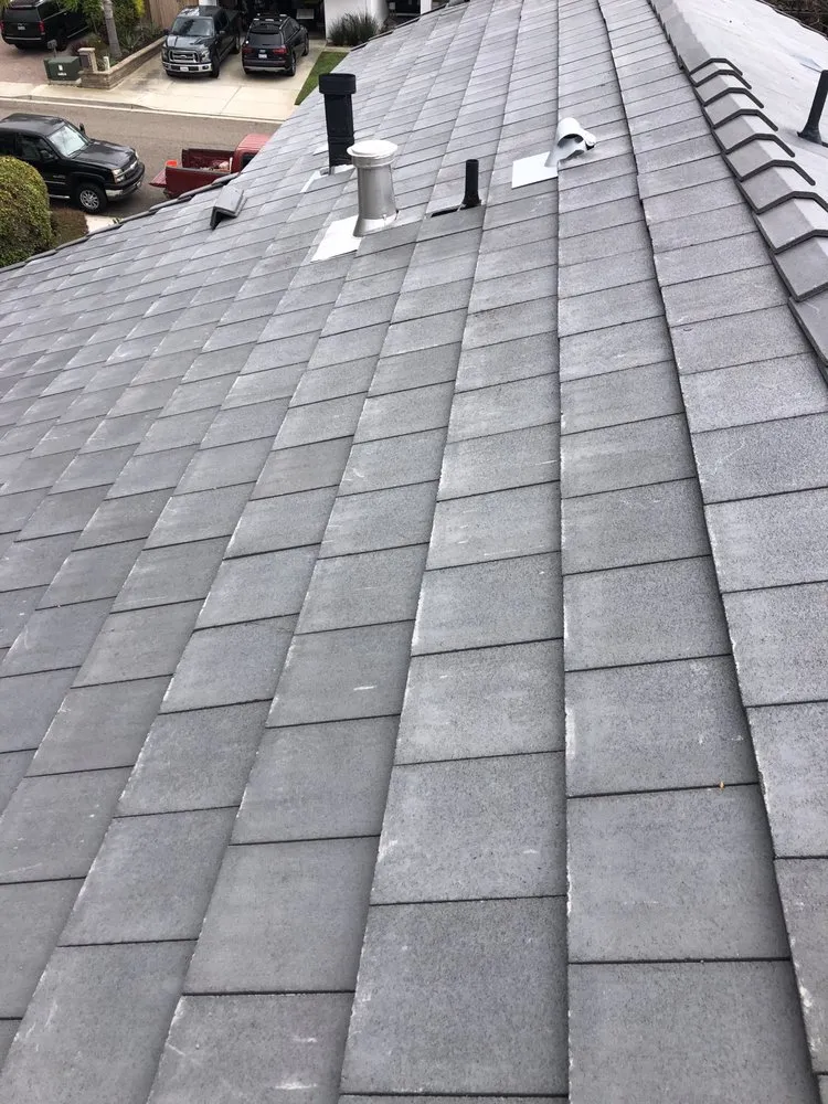 Slide of Escamilla’s Roofing and Rain Gutters