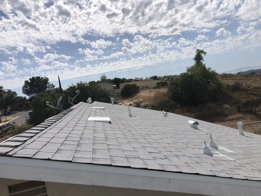 Slide of Escamilla’s Roofing and Rain Gutters