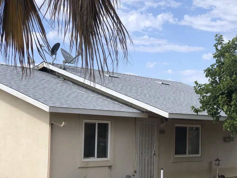 Slide of Escamilla’s Roofing and Rain Gutters