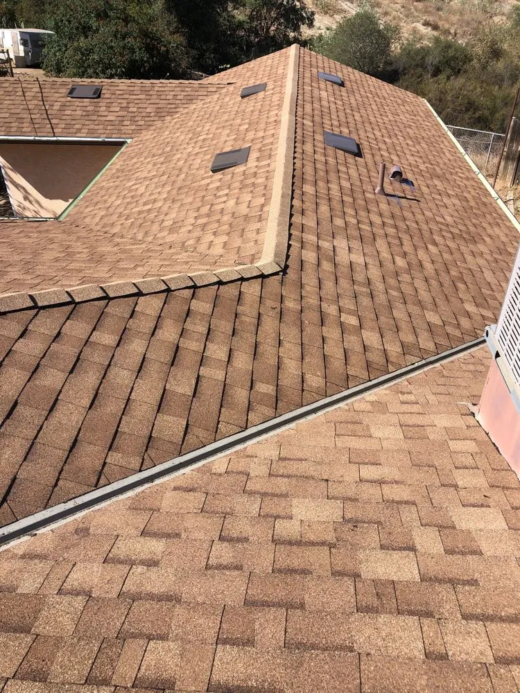 Slide of Escamilla’s Roofing and Rain Gutters