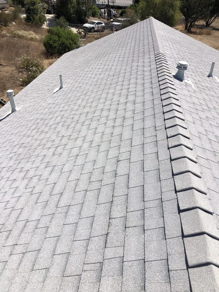 Slide of Escamilla’s Roofing and Rain Gutters