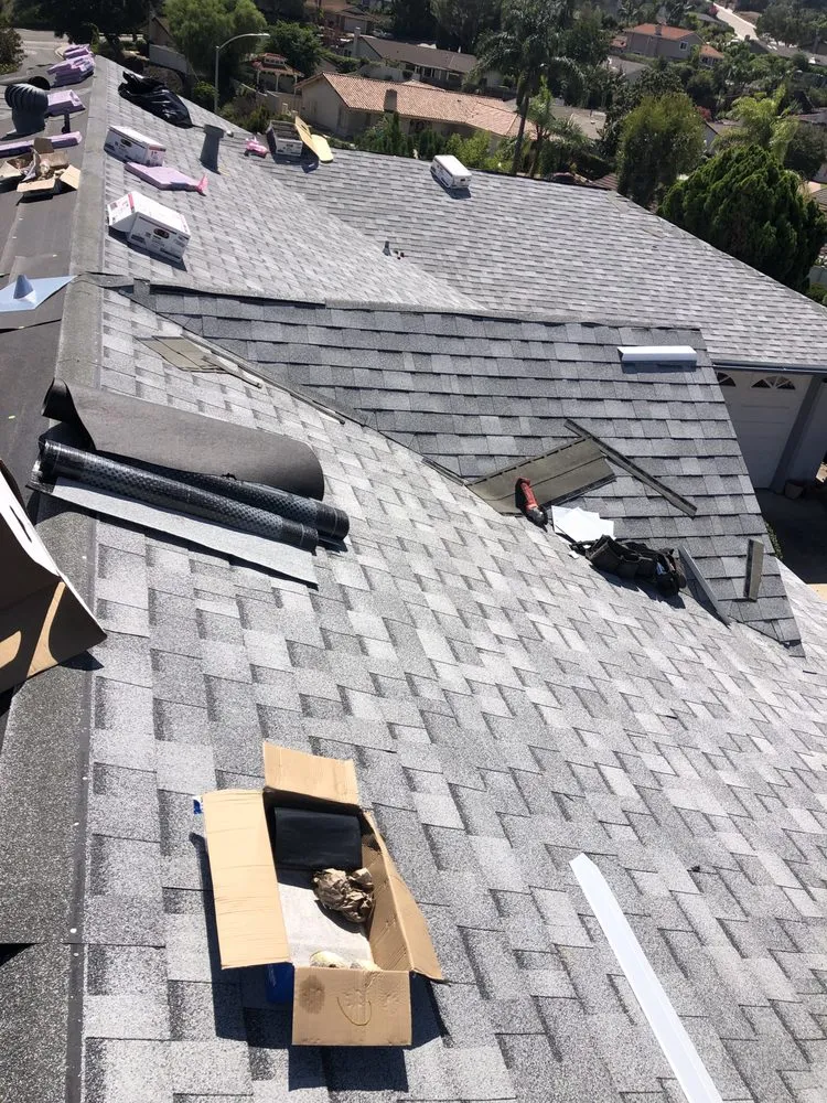 Slide of Escamilla’s Roofing and Rain Gutters