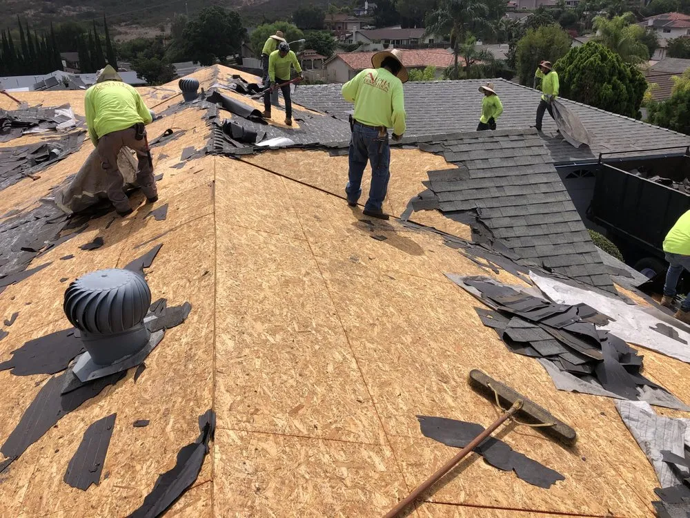 Slide of Escamilla’s Roofing and Rain Gutters