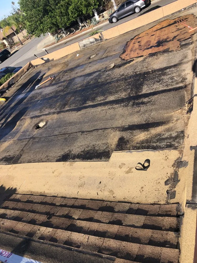 Slide of Escamilla’s Roofing and Rain Gutters