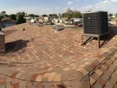 Slide of Escandon Roofing