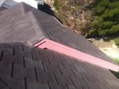 Slide of Escandon Roofing