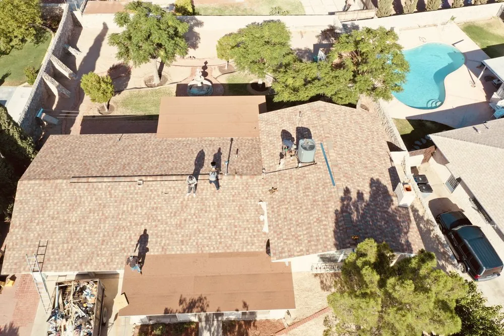 Slide of Escandon Roofing