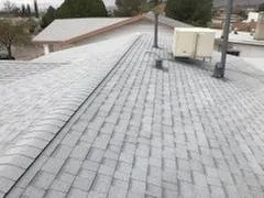 Slide of Escandon Roofing