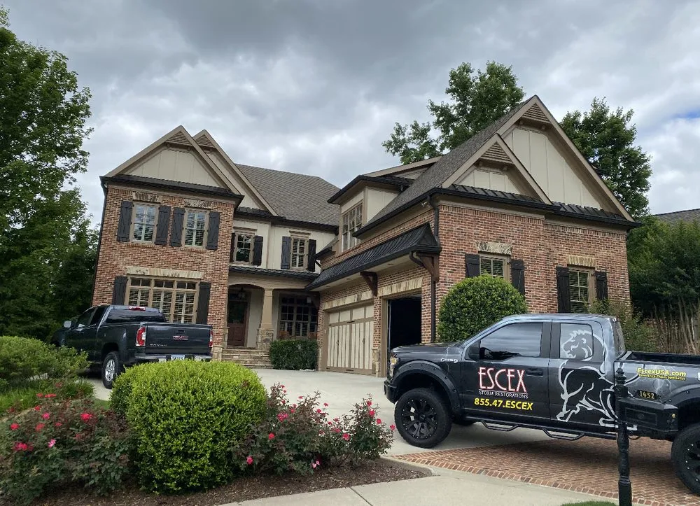 Slide of Escex Roofing and Restorations