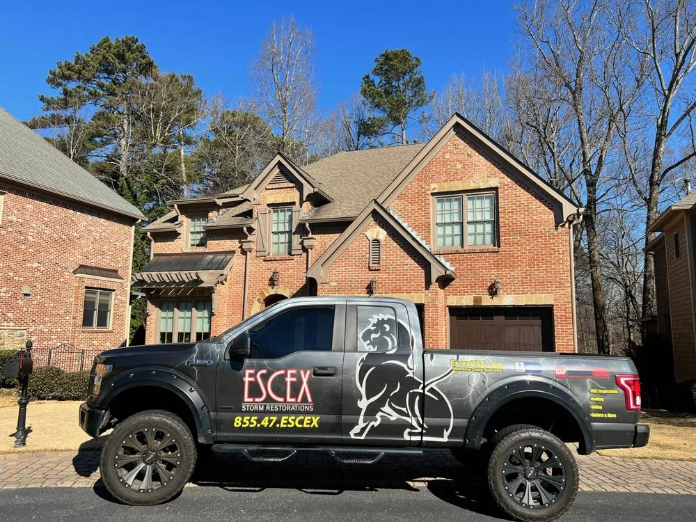 Slide of Escex Roofing and Restorations