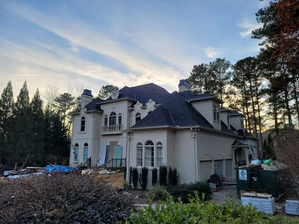 Slide of Escex Roofing and Restorations