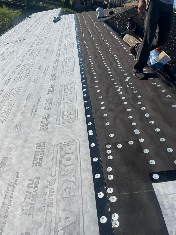 Slide of Escobar Roofing