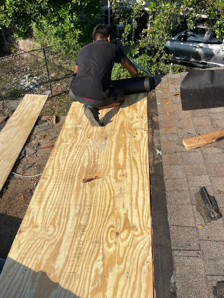 Slide of Escobar Roofing