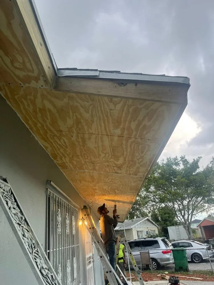 Slide of Escobar Roofing