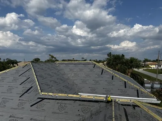 Escoto Construction Logo