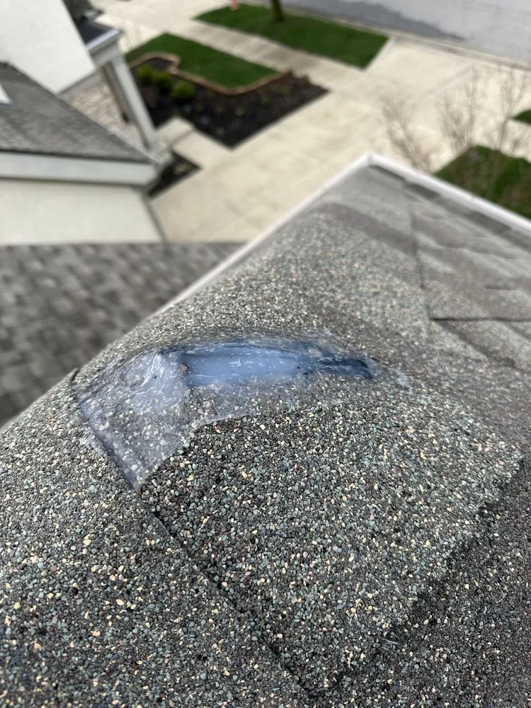 Slide of Esendemir Gutter & Roofing