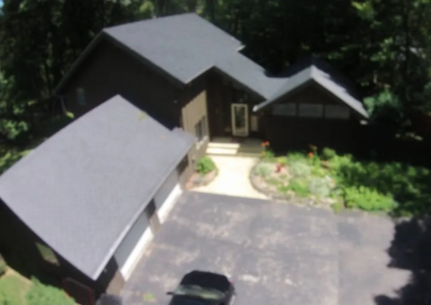 Slide of Esow Roofing