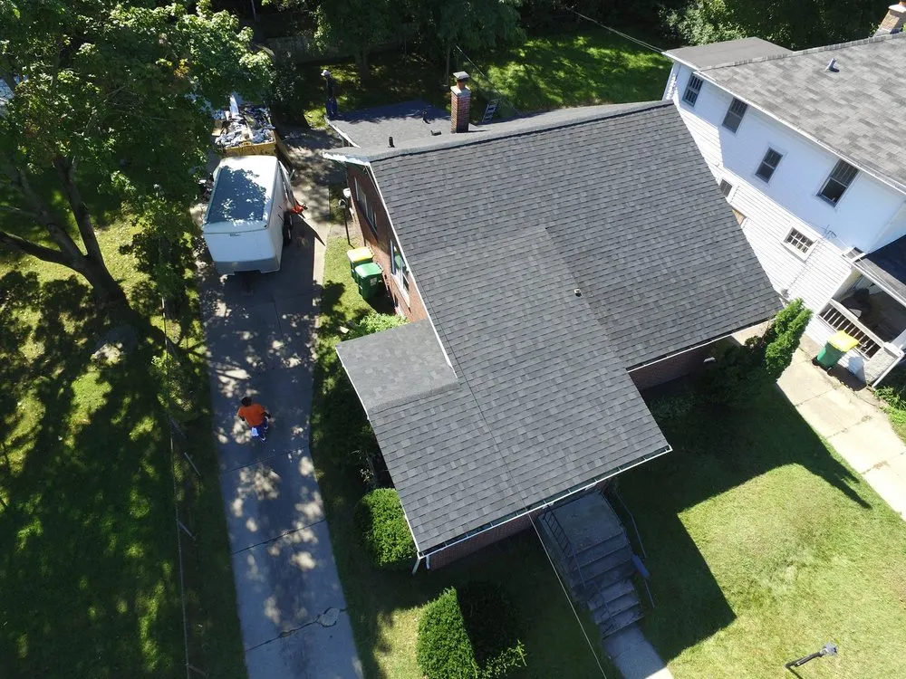 Slide of Esow Roofing