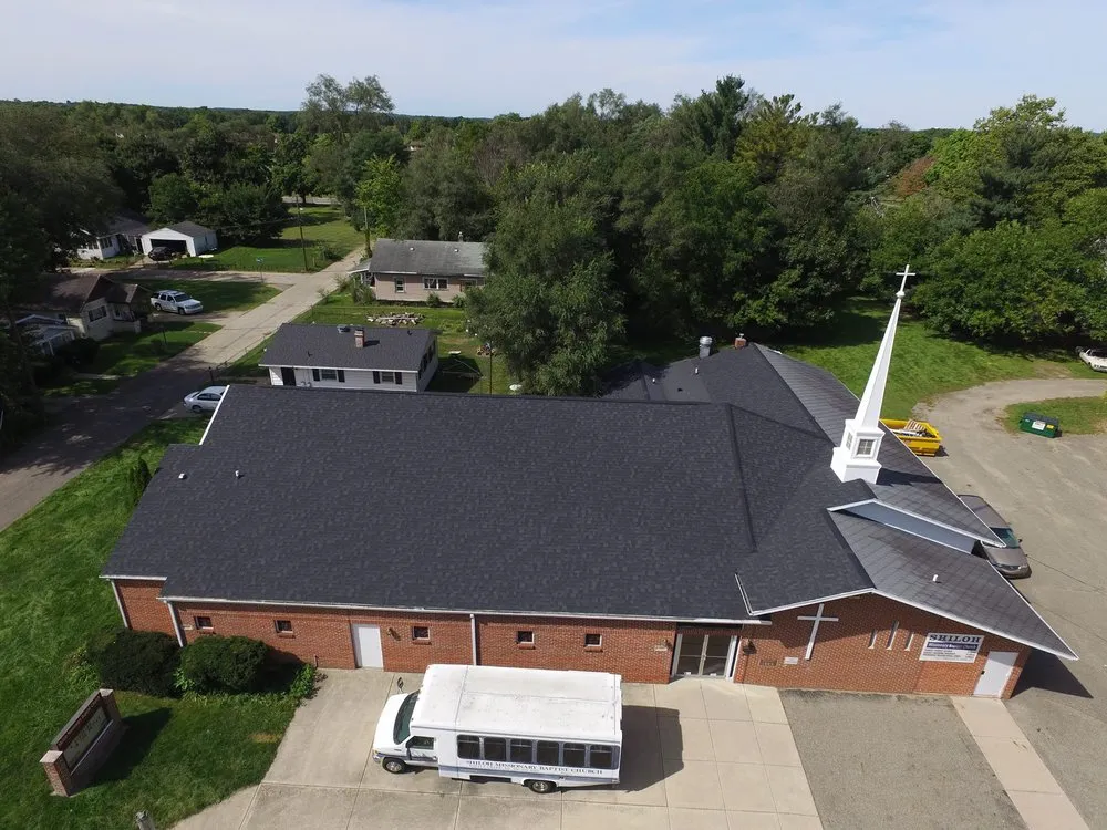 Slide of Esow Roofing