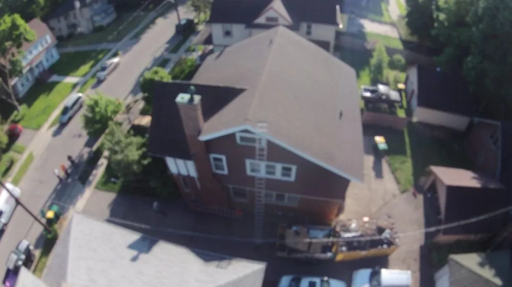 Slide of Esow Roofing