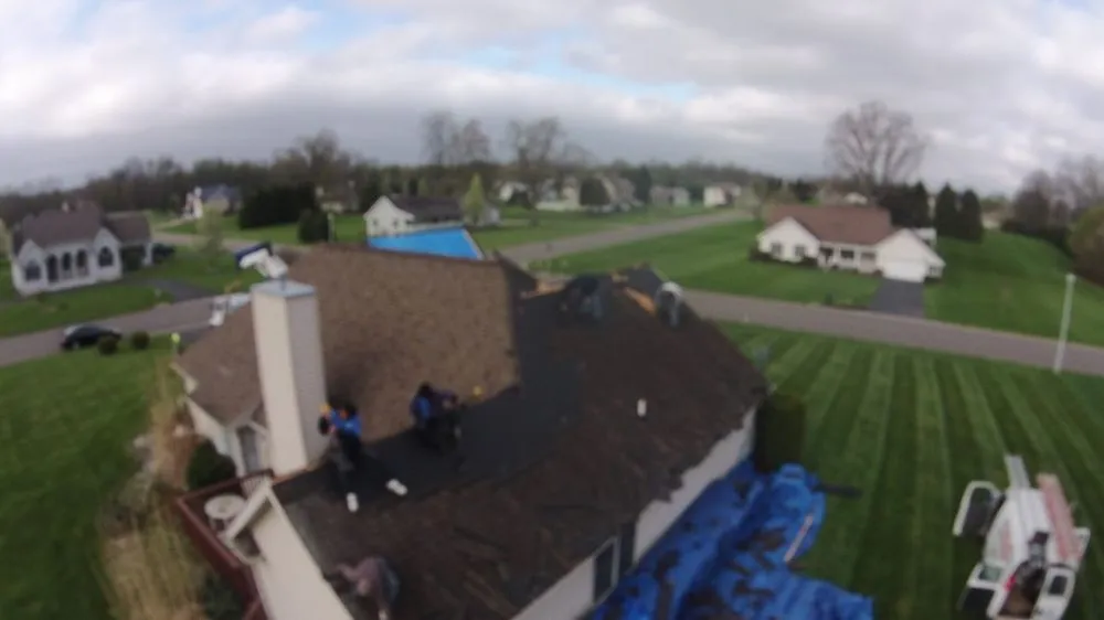 Slide of Esow Roofing