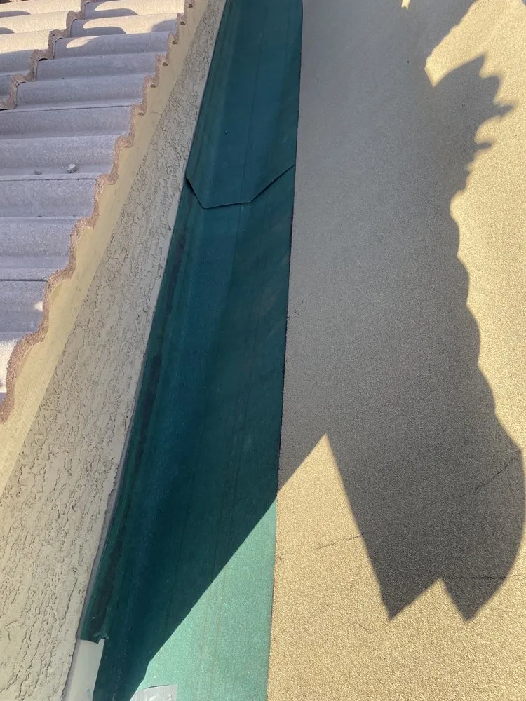 Slide of Esperto Roofing