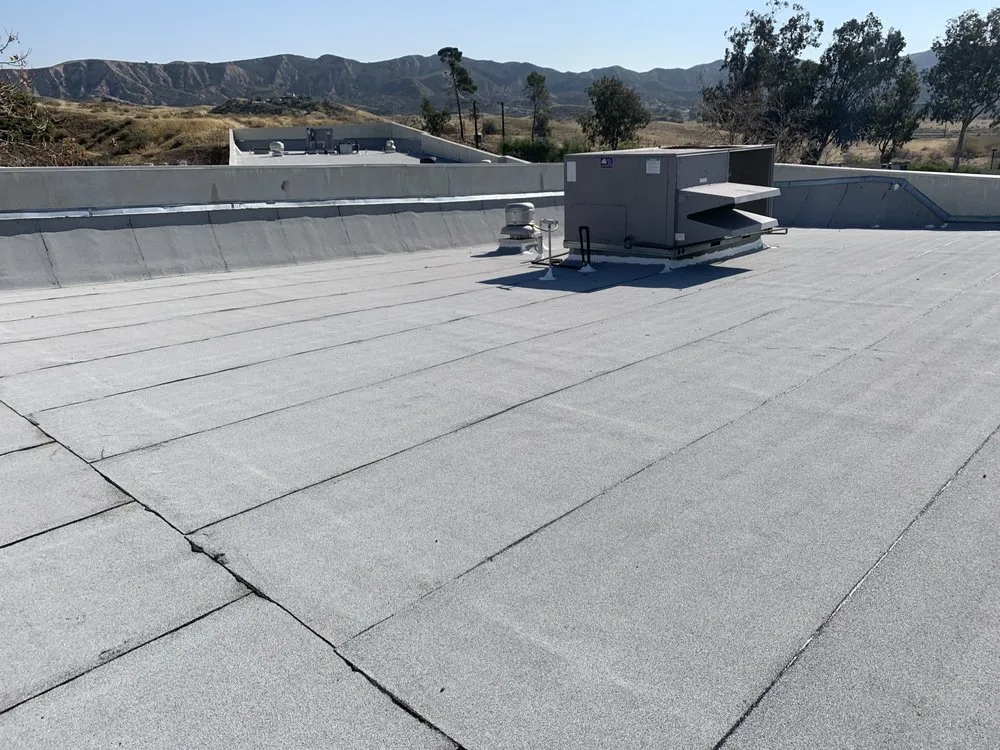 Slide of Espinal's Roofing & Waterproofing