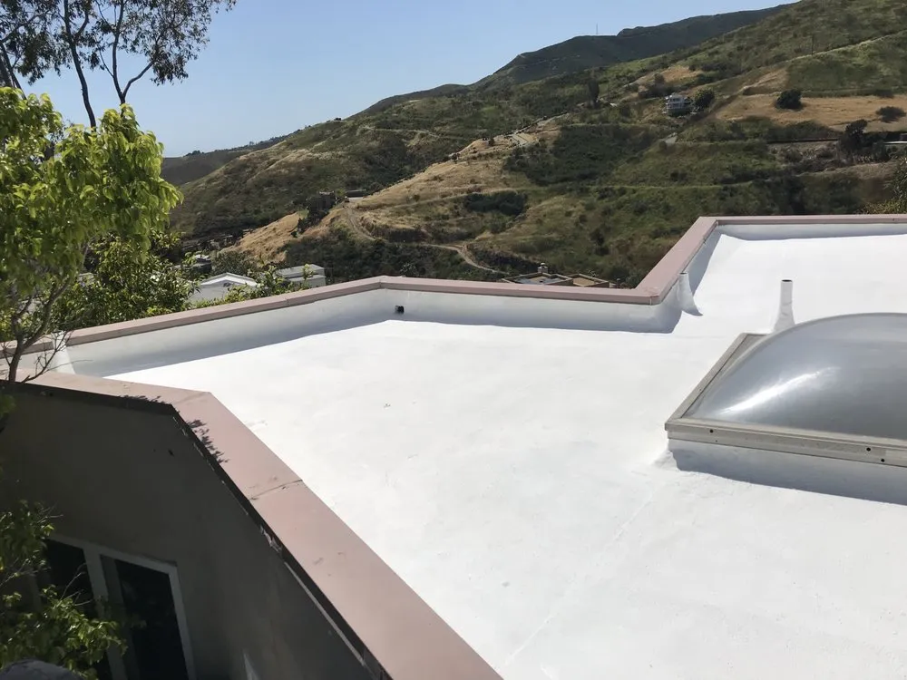 Slide of Espinal's Roofing & Waterproofing