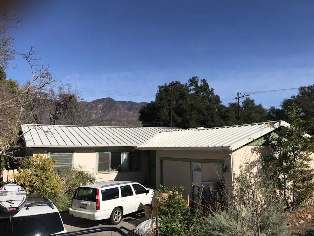 Slide of Espino Roofing