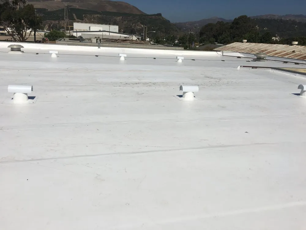 Slide of Espino Roofing