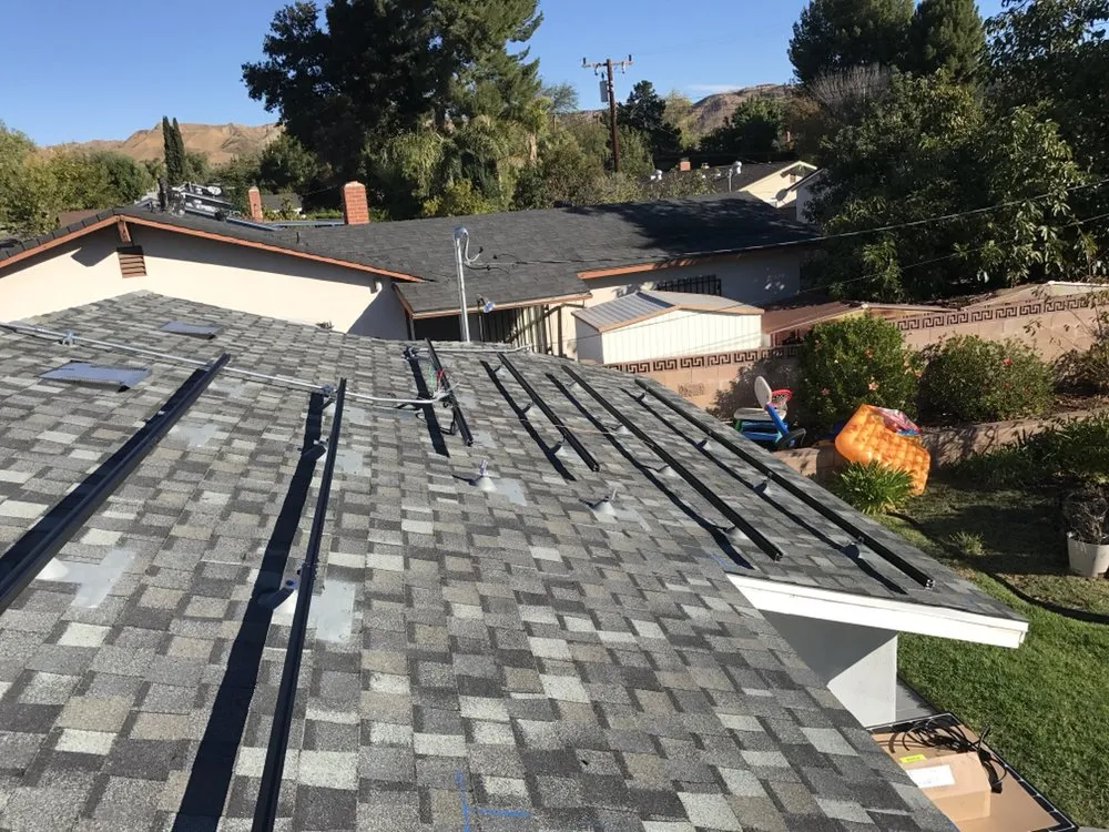 Slide of Espino Roofing