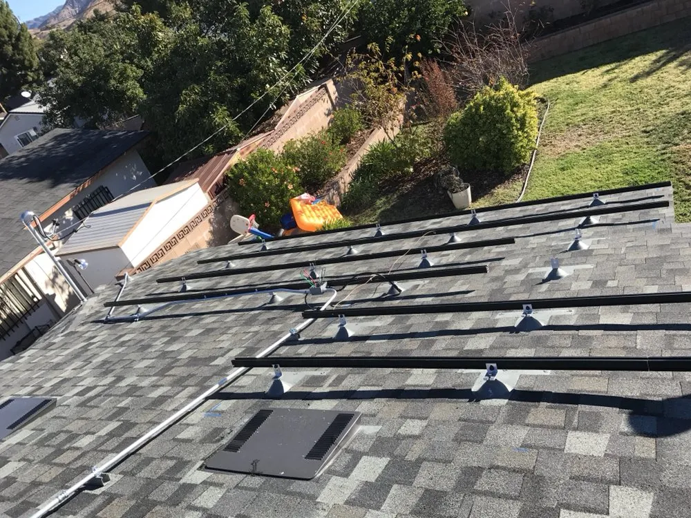 Slide of Espino Roofing