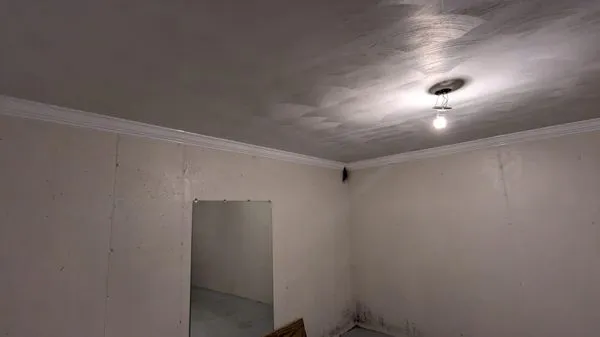 Espinosa Construction Logo