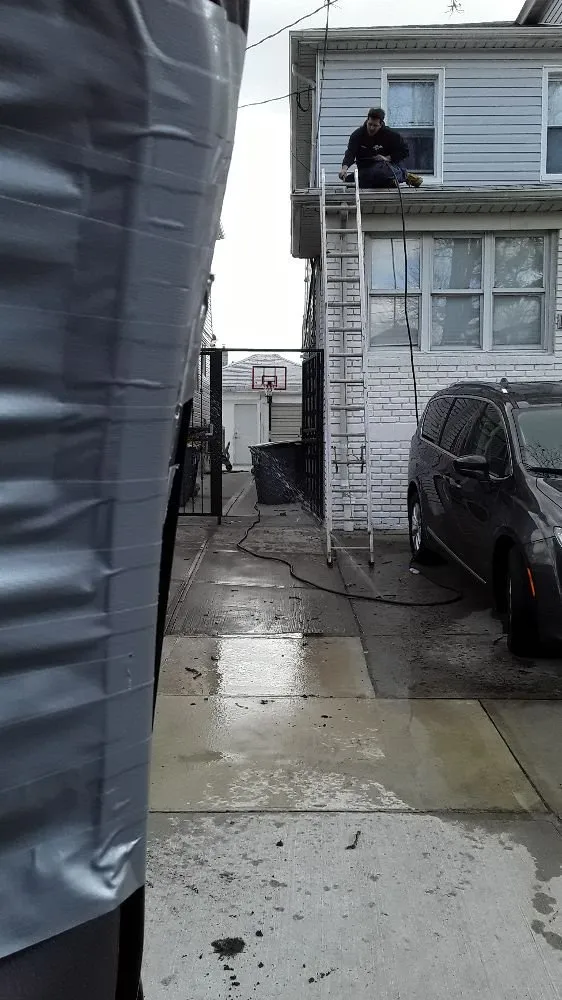 Slide of Esposito and sons seamless gutters