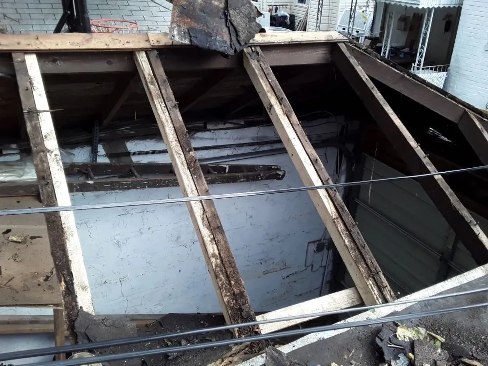 Slide of Esposito and sons seamless gutters