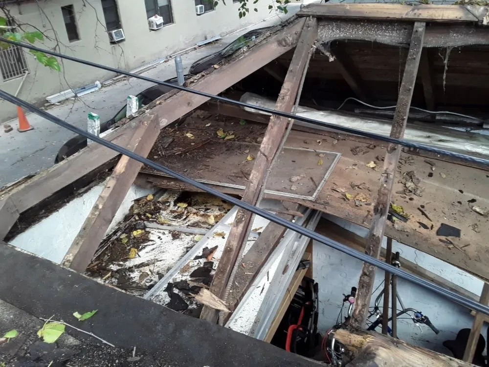 Slide of Esposito and sons seamless gutters