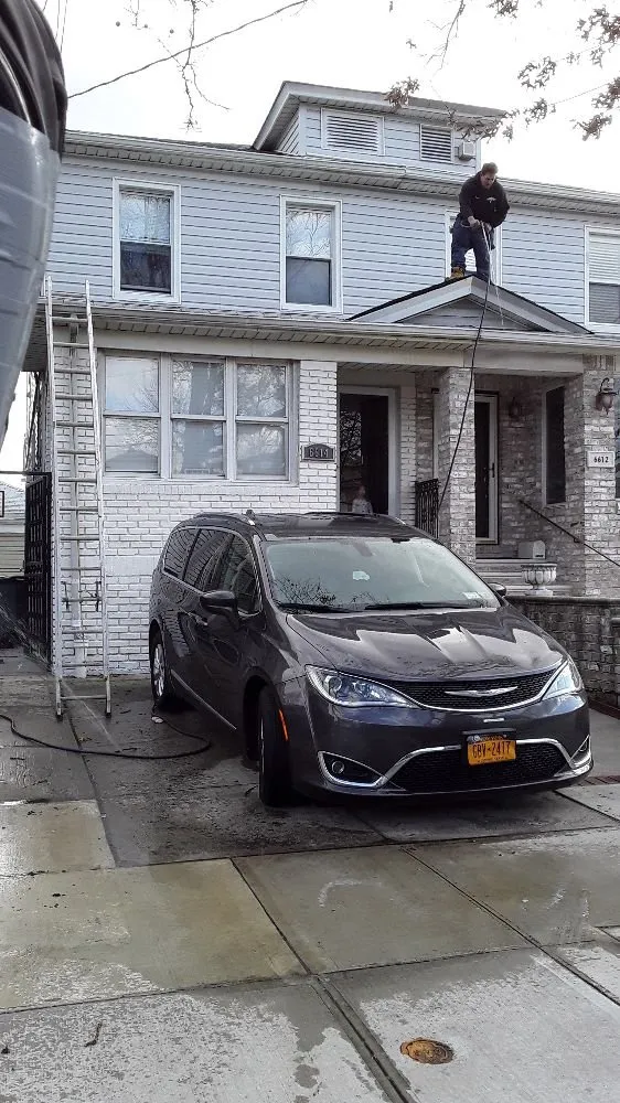 Slide of Esposito and sons seamless gutters