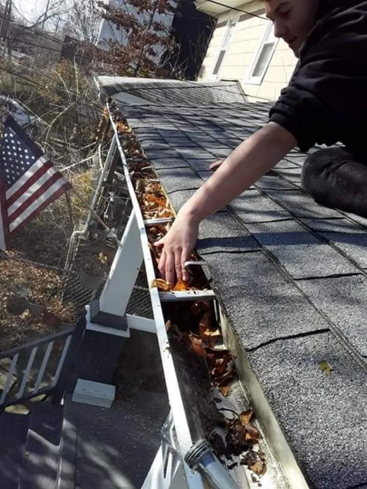 Slide of Esposito and sons seamless gutters