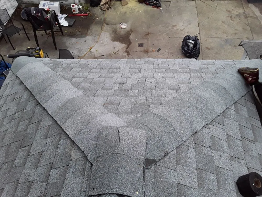 Slide of Esposito and sons seamless gutters