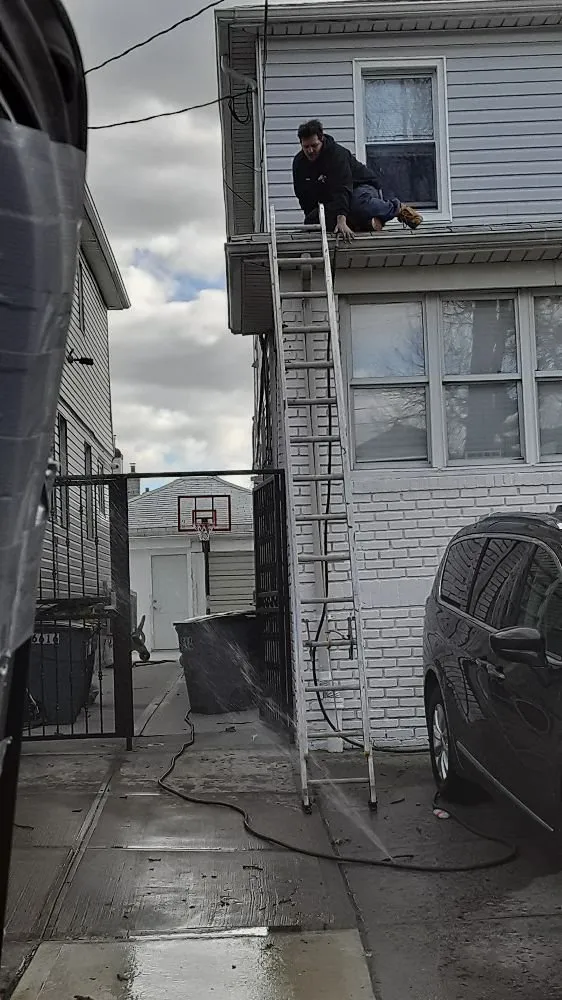 Slide of Esposito and sons seamless gutters