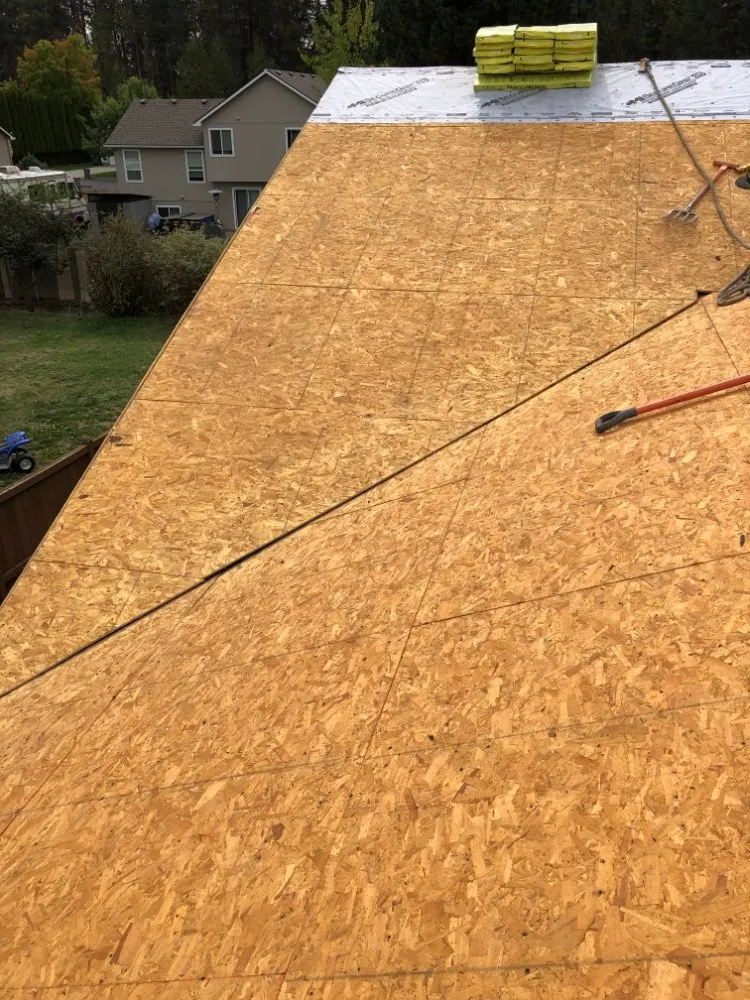 Slide of Esquivel Roofing and general construction